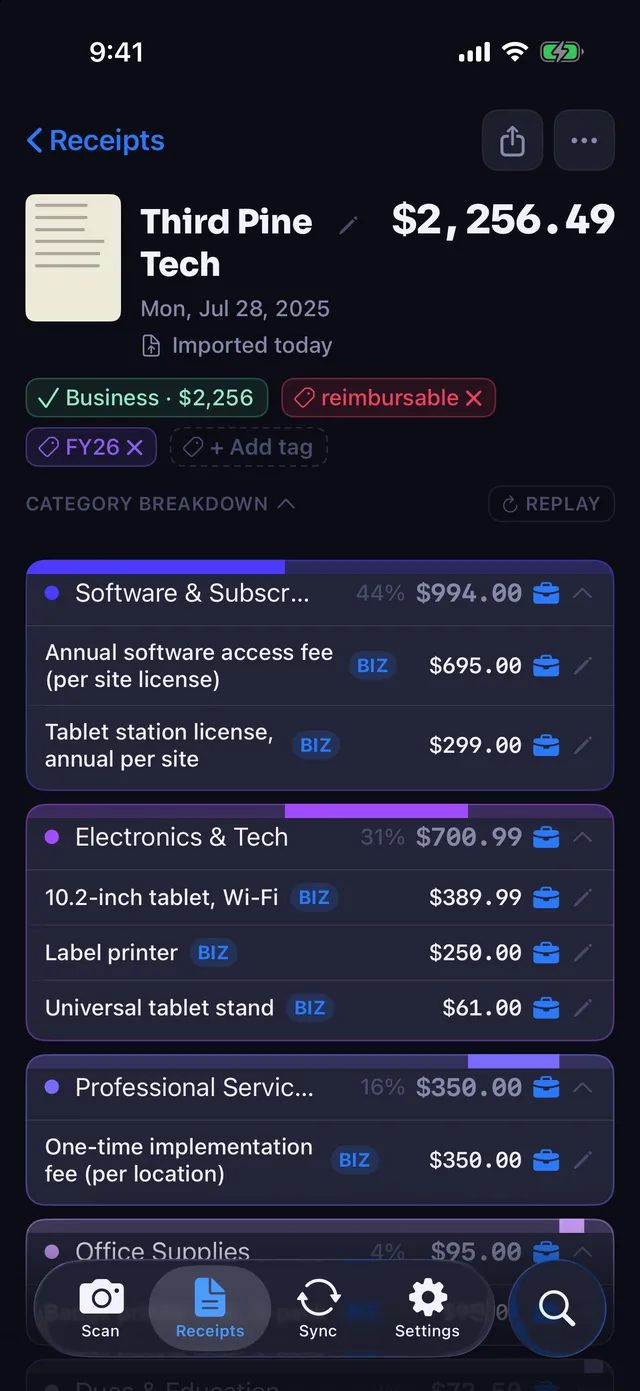 A $2,256.49 software and equipment invoice in Receipt Rabbit with the category breakdown expanded, every line marked business